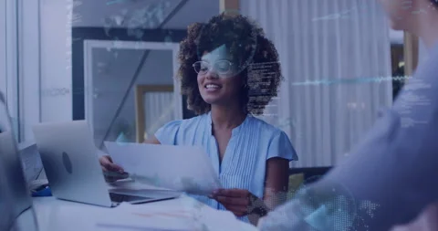 Office professionals reviewing papers in tech office, displaying floating code Stock Footage 307432368