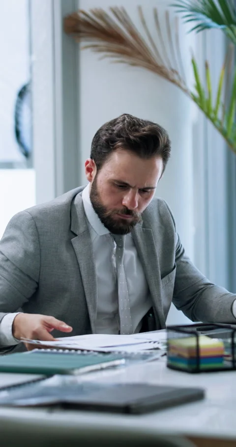 Office, reading documents and business man problem solving for accounting Stock Footage 311567666