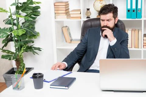 Office routine. Manager solving business problems. Businessman in charge of 写真素材