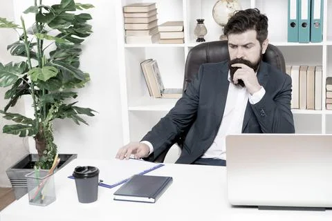 Office routine. Manager solving business problems. Businessman in charge of 写真素材
