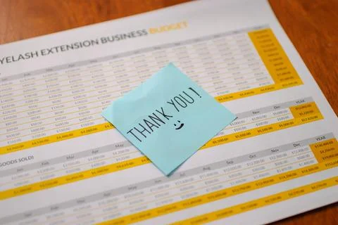 Office setting thank you note for eyelash extension business report - profe.. Stock Photos
