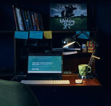 Office setup on a desk with a computer and books in vintage Foto stock