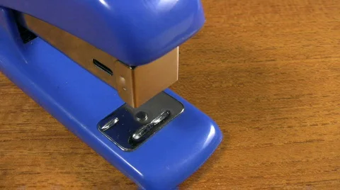 Office stapler. Stapling papers together. Stock Footage
