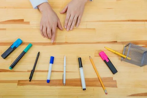 Office table with accessories: a white sheet of paper, a blue-pink marker, a 写真素材