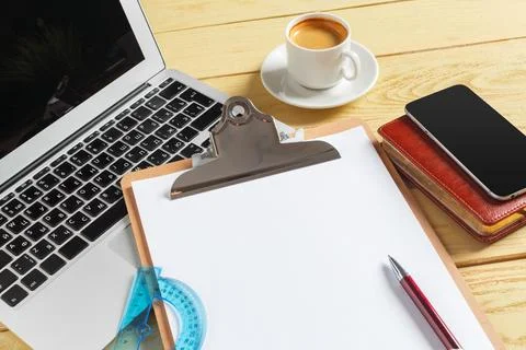 Office table background with coffee cup, pencils and computer keyboard. Business Foto stock