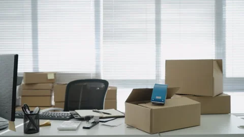 Office table with boxes on it,4K Stock Footage 243429056