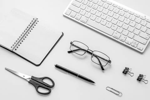 Office table desk flat lay. Workspace with laptop and office supplies Stock Photos