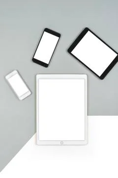 Office table with digital tablet, smartphone and mouse on isolated pure white Stock Photos
