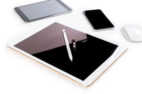 Office table with digital tablet, smartphone, mouse and pencil on isolated pu Stock Photos