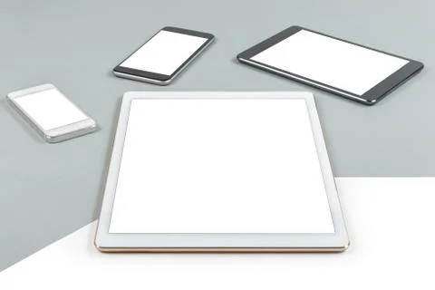 Office table with digital tablet, smartphone and mouse on isolated pure white Stock Photos