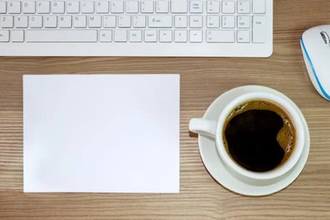 Office table with empty white paper Stock Photos