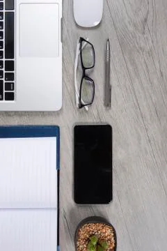 Office table with laptop computer, notebook, digital tablet, pen, smartphone, Stock Photos