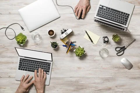 Office table with laptop Stock Photos