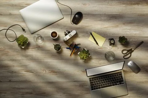 Office table with laptop Stock Photos
