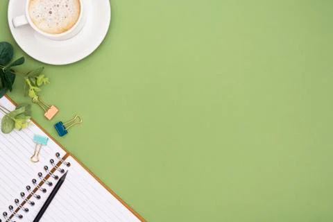 Office table with notebook and coffee cup. Table top, work space with copy sp Stock-Fotos
