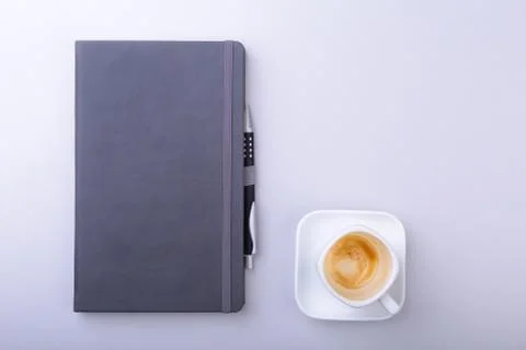 Office table with notebook, computer keyboard,, cup of coffee, tablet pc. copy Stock Photos