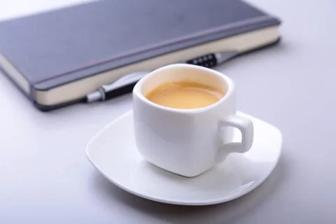 Office table with notebook, computer keyboard,, cup of coffee, tablet pc. copy Foto stock