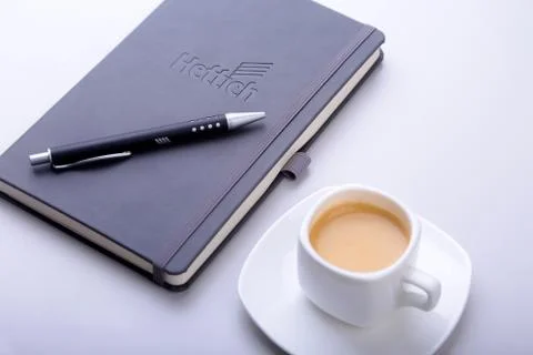 Office table with notebook, computer keyboard,, cup of coffee, tablet pc. copy Stock Photos