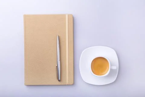 Office table with notebook, computer keyboard,, cup of coffee, tablet pc. copy Stock Photos