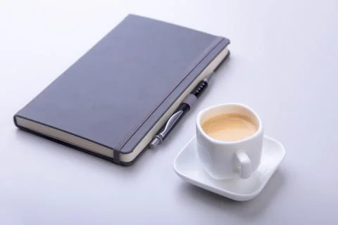 Office table with notebook, computer keyboard,, cup of coffee, tablet pc. copy Stock Photos