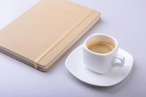 Office table with notebook, computer keyboard,, cup of coffee, tablet pc. copy Stock Photos