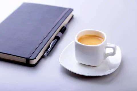 Office table with notebook, computer keyboard,, cup of coffee, tablet pc. copy Stock Photos