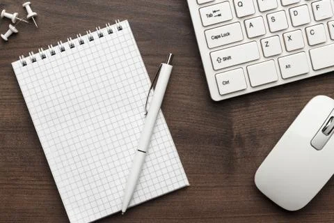 Office table with notepad and computer Stock Photos