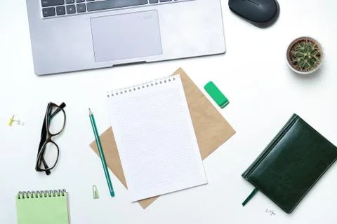 Office table with notepad, computer and notepad. View from above with copy space 库存照片