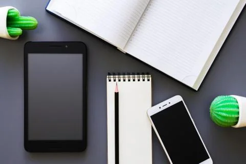 Office table with planner and gadgets Stock Photos