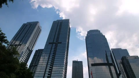 Office tall building. Low angle view of skyscrapers office building in cent.. Stock Footage 281578625