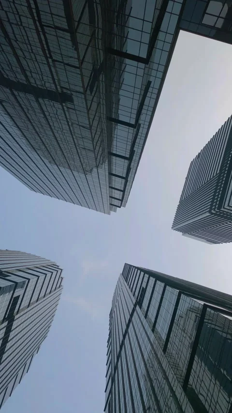 Office tall building. Low angle view of skyscrapers office building in cent.. Stock Footage 314104014
