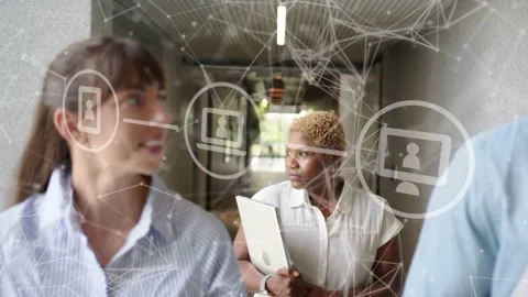 Office team walking hall, chat initiating node overlay, lead woman with laptop Stock Footage 333540140