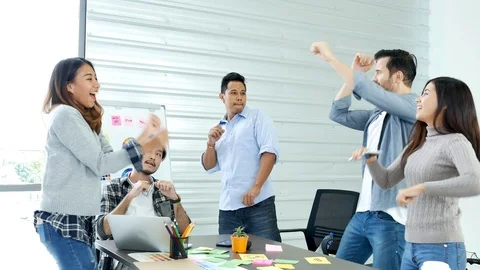 Office teamwork celebration working happiness Happy business people dance expres Stock-Footage 124297446