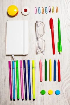 Office tools assortment on white table Foto stock
