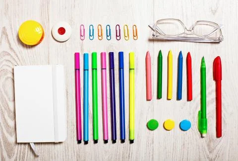 Office tools assortment on white table Stock Photos