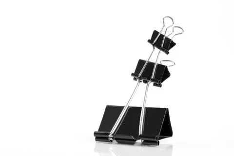 Office tools - black clips Stock Photos