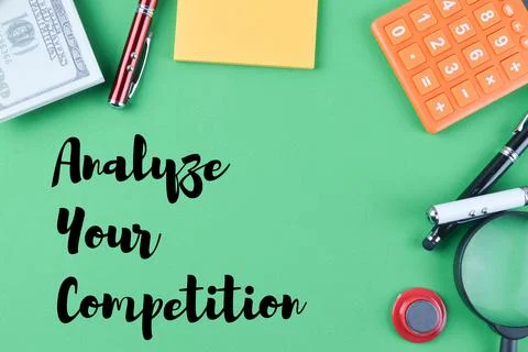 Office tools with text ANALYZE YOUR COMPETITION Stock Photos