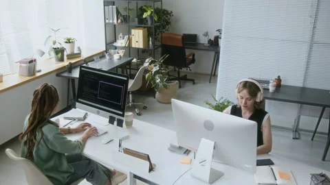 Office with Two Female Programmers Inside Stock Footage 313496337