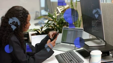 Office user tapping phone and causing blue data overlays expanding across desk Stock Footage 335465985