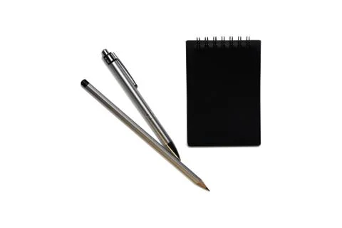 Office on a white background. Notepad, pen. Business and financial concept. Stock-Fotos