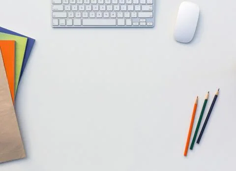 Office White Table with Computer Keyboard Mouse Color Pencils Booklets and other Stock Photos