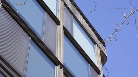Office windows with blue sky in the background. Stock Footage 270435846