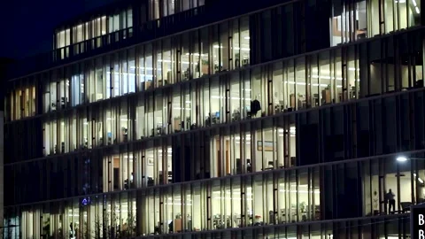Office windows at night corporative 스톡 동영상 313493372