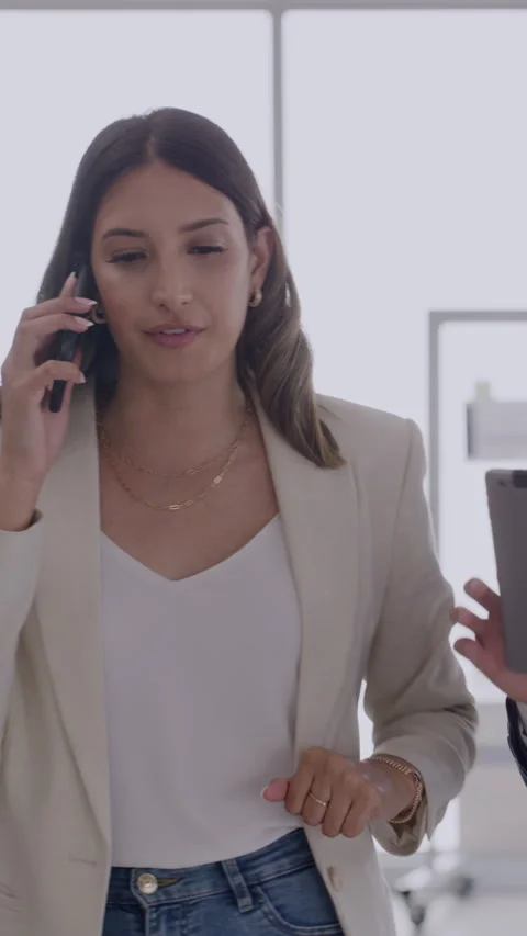 Office, woman and multitasking with tablet, phone call and signing for article Stock Footage 323785578
