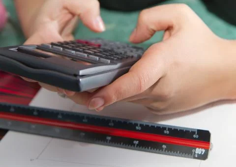 Office work per calculator Stock Photos