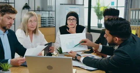 Office work concept where attractive bearded skilled businessman sitting at Stock Footage 159655216