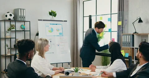 Office work concept where good-looking confident skilled mixed race team sitting Stock Footage 159664024