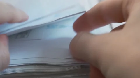Office Worker Accountant Sorting Through Documents Looking For A Payment Order.  스톡 동영상 132795690