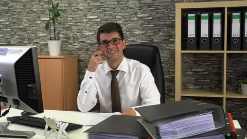 Office worker advises client front view Stock Footage 115396179