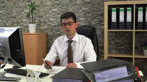 Office worker advises client front view Stock Footage 115695349